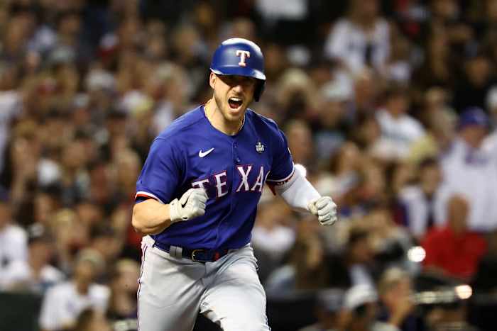 Texas Rangers catcher Mitch Garver reacts after hitting a go-ahead RBI single against the Arizona Diamondbacks in the seventh inning in Game 5 of the 2023 World Series Wednesday night at Chase Field in Phoenix.